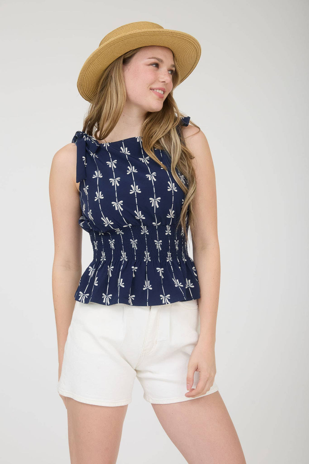 BOW LINE PATTERN TIE SHOULDER SLEEVELESS BLOUSE